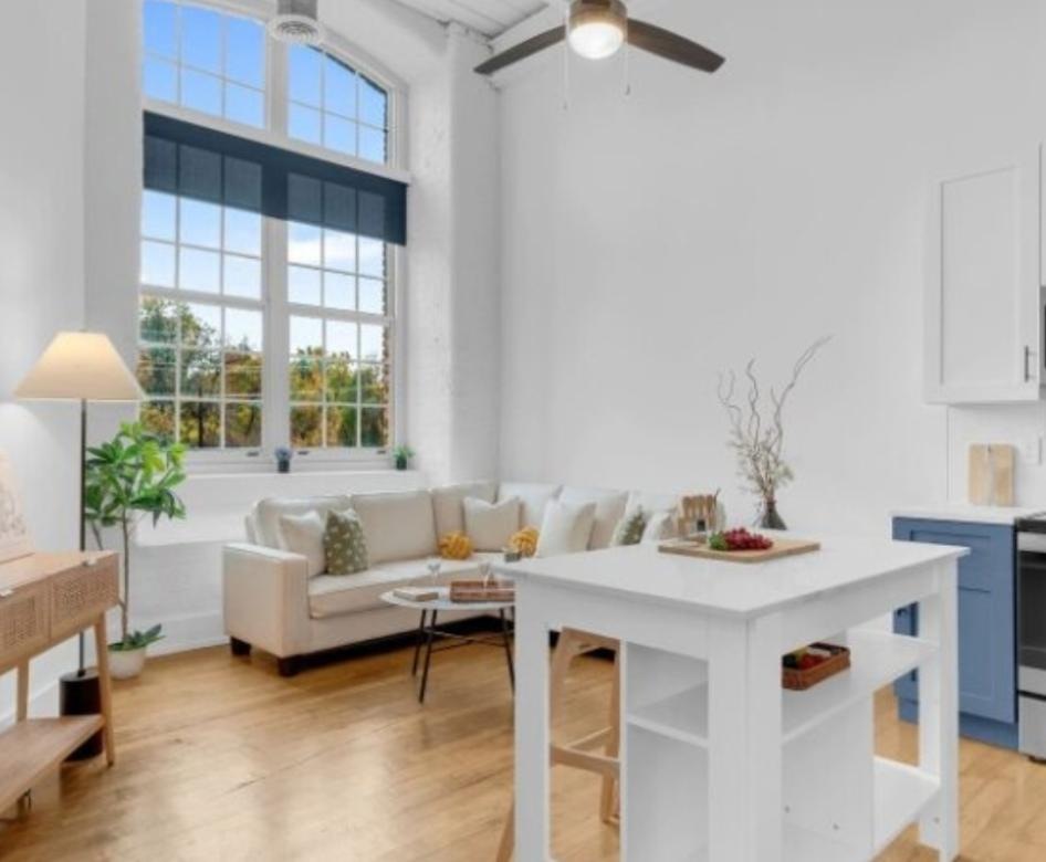 kitchen and living room with large window