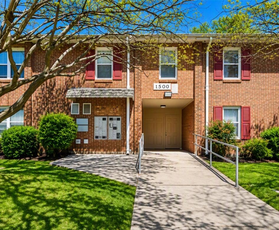 a brick building with a walkway