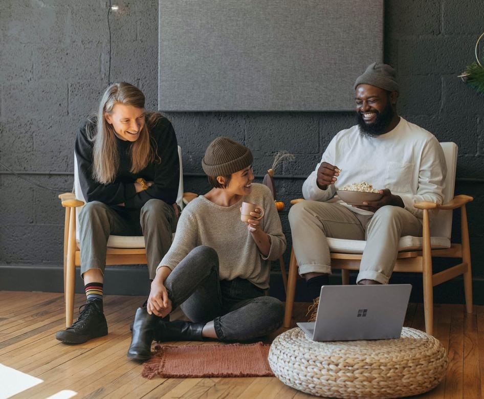 Group of people sitting around talking 